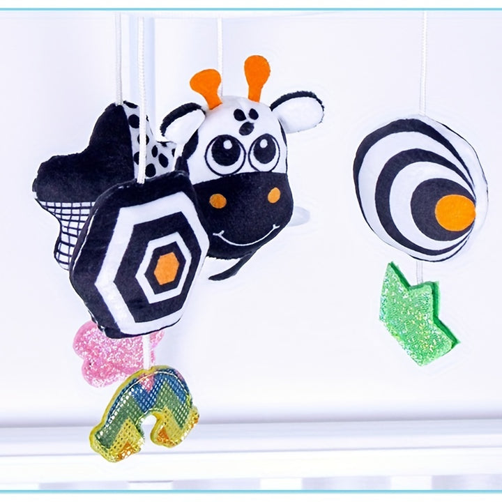 Visual Stimulation On the Go
This black and white hanging baby toy features soft animal designs, gentle wind chimes, and high-contrast colors to support early visual development. Perfect for cribs, strollers, car seats, and baby carriers. 👶🖤🤍