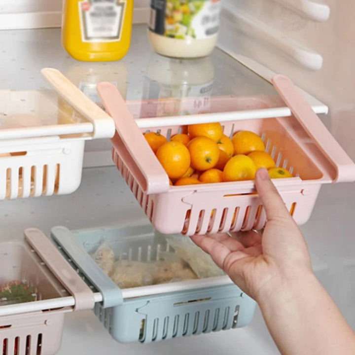 Maximize Your Fridge Space!
🧊 Say goodbye to clutter with this retractable, multi-functional storage rack. Perfect for organizing fruits, veggies, snacks & more.
💦 Built-in drain keeps everything fresh and dry.
✨ Slide, store, and save space instantly!