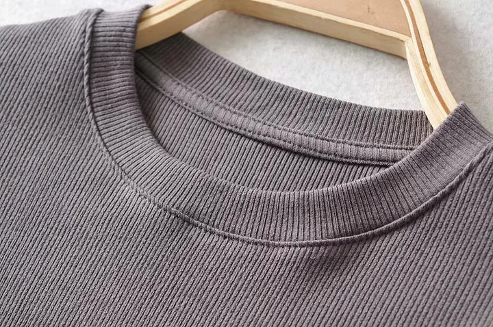 Turn Up the Heat in Style
This slim-fit, stretchy crop top features a sexy O-neck and short sleeves — perfect for summer days and night-outs. Soft, flattering, and made to hug your curves. ☀️👚