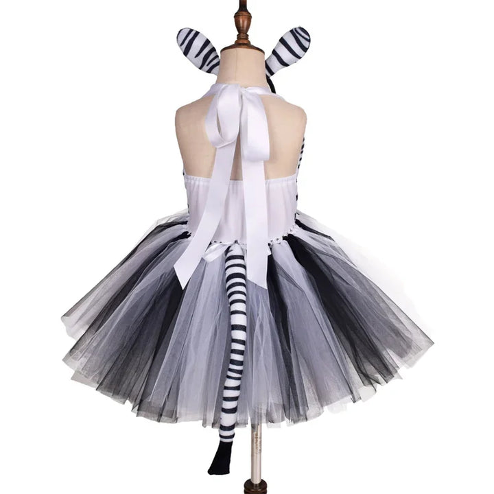 Wild and Wonderful!
Cute animal prints and a fluffy tutu make this costume perfect for Halloween, birthdays, or school plays. Soft, comfy, and full of forest fun!
🦓 Includes: Animal print tutu dress
🎉 Occasions: Halloween, birthdays, themed parties.