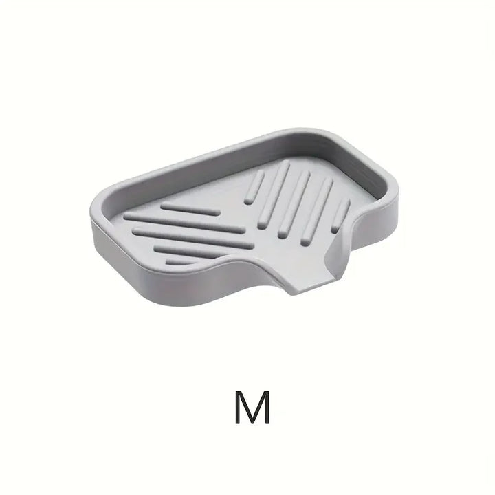 No More Messy Sinks!
This silicone faucet mat doubles as a drying tray for soap, sponges, and dispensers. Waterproof, non-slip, and perfect for keeping your countertop clean and splash-free. 🧼🚰