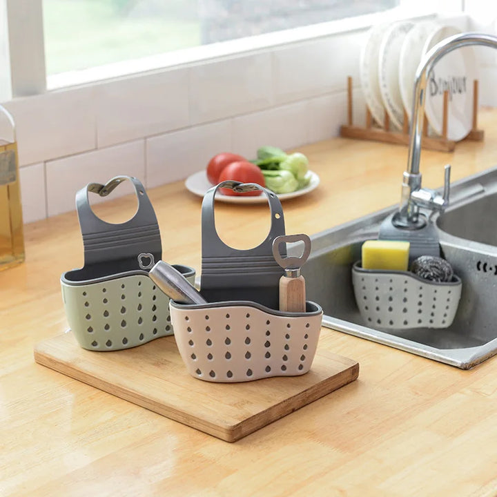Keep Your Sink Neat & Tidy
This double-layer hanging sink rack fits most faucets and holds sponges, brushes, and more. Durable, space-saving, and perfect for keeping your kitchen organized and clutter-free. 🧽🚰