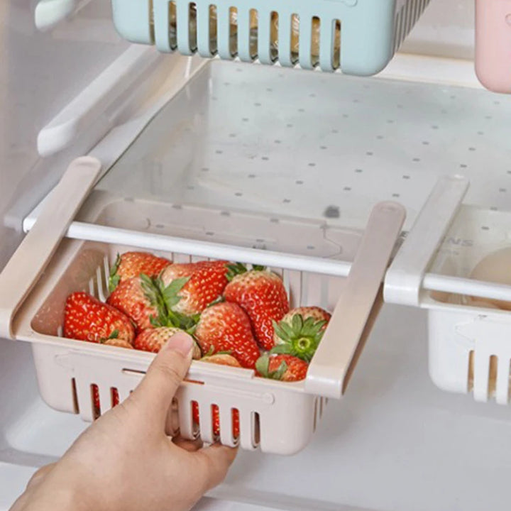 Maximize Your Fridge Space!
🧊 Say goodbye to clutter with this retractable, multi-functional storage rack. Perfect for organizing fruits, veggies, snacks & more.
💦 Built-in drain keeps everything fresh and dry.
✨ Slide, store, and save space instantly!
