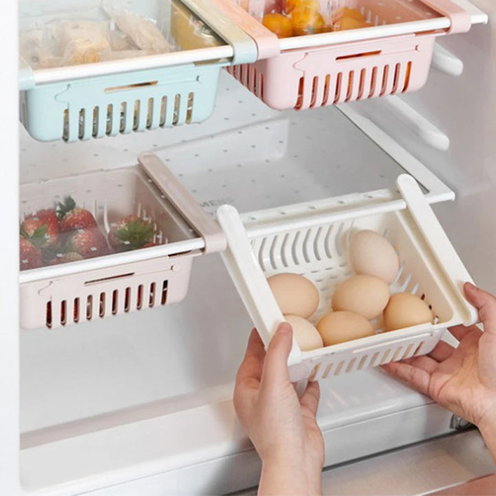 Maximize Your Fridge Space!
🧊 Say goodbye to clutter with this retractable, multi-functional storage rack. Perfect for organizing fruits, veggies, snacks & more.
💦 Built-in drain keeps everything fresh and dry.
✨ Slide, store, and save space instantly!