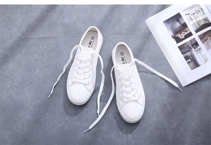 Unisex White Canvas Sneakers 👟
Classic, comfy, and versatile. These lace-up vulcanized shoes are perfect for students and everyday wear. Great fit for both men and women!