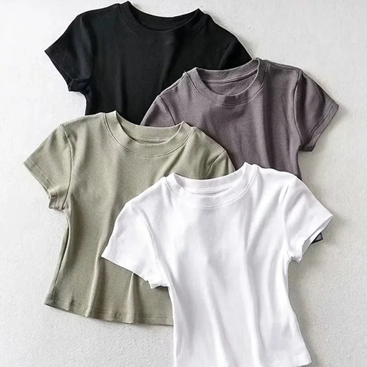 Turn Up the Heat in Style
This slim-fit, stretchy crop top features a sexy O-neck and short sleeves — perfect for summer days and night-outs. Soft, flattering, and made to hug your curves. ☀️👚