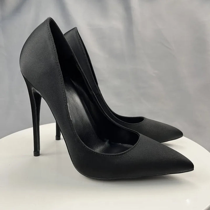 👠 Tikicup Satin High Heels – All Black Elegance
Chic, sexy, and made to impress.
✅ Pointed toe elegance
✅ Formal & fashionable
✅ Perfect for parties or formal looks

🛒 Shop now at www.clickmart.com