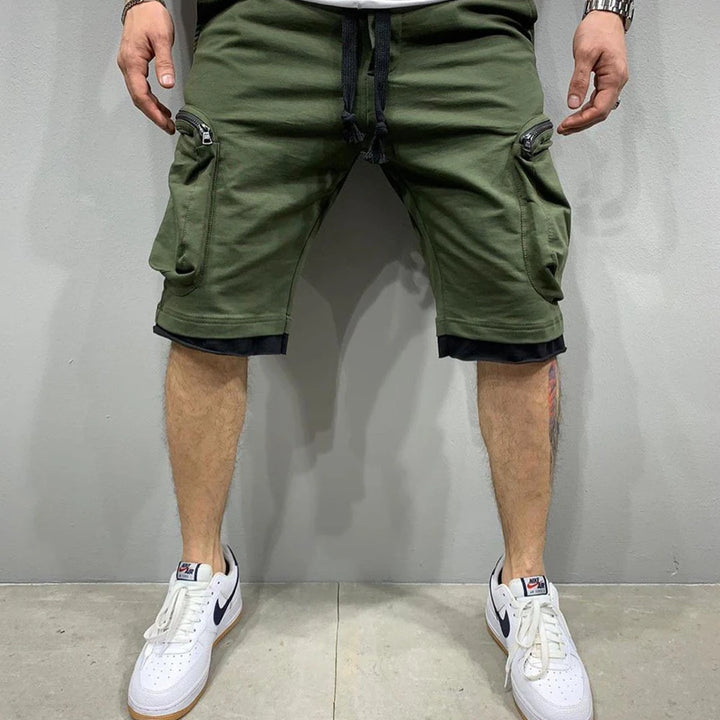 Men’s Summer Cargo Shorts 🟡
Stay cool and active in these breathable cotton shorts. Perfect for workouts, jogging, or casual wear. Features multiple pockets for convenience and style.