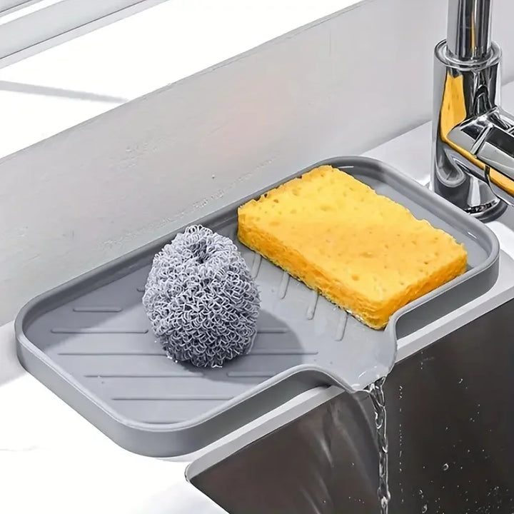 No More Messy Sinks!
This silicone faucet mat doubles as a drying tray for soap, sponges, and dispensers. Waterproof, non-slip, and perfect for keeping your countertop clean and splash-free. 🧼🚰