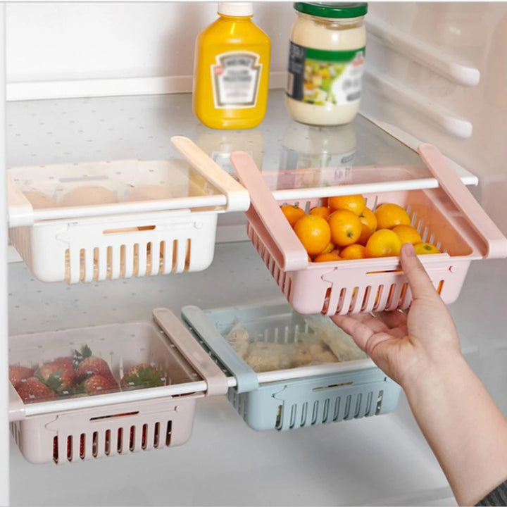 Maximize Your Fridge Space!
🧊 Say goodbye to clutter with this retractable, multi-functional storage rack. Perfect for organizing fruits, veggies, snacks & more.
💦 Built-in drain keeps everything fresh and dry.
✨ Slide, store, and save space instantly!