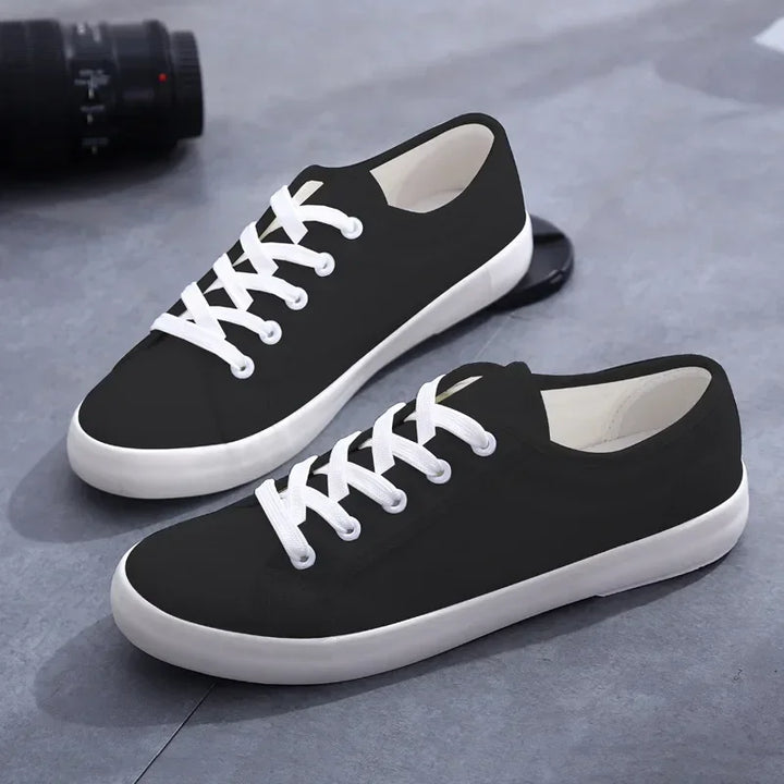 Unisex White Canvas Sneakers 👟
Classic, comfy, and versatile. These lace-up vulcanized shoes are perfect for students and everyday wear. Great fit for both men and women!