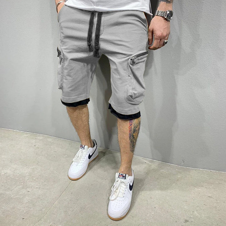Men’s Summer Cargo Shorts 🟡
Stay cool and active in these breathable cotton shorts. Perfect for workouts, jogging, or casual wear. Features multiple pockets for convenience and style.