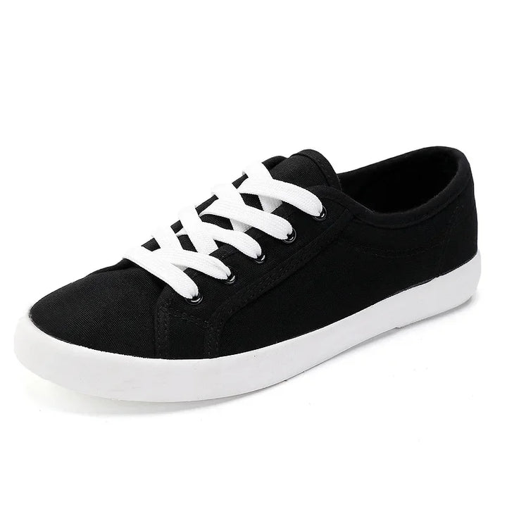 Unisex White Canvas Sneakers 👟
Classic, comfy, and versatile. These lace-up vulcanized shoes are perfect for students and everyday wear. Great fit for both men and women!