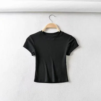 Turn Up the Heat in Style
This slim-fit, stretchy crop top features a sexy O-neck and short sleeves — perfect for summer days and night-outs. Soft, flattering, and made to hug your curves. ☀️👚