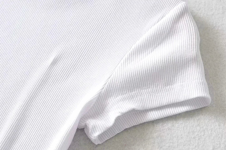 Turn Up the Heat in Style
This slim-fit, stretchy crop top features a sexy O-neck and short sleeves — perfect for summer days and night-outs. Soft, flattering, and made to hug your curves. ☀️👚