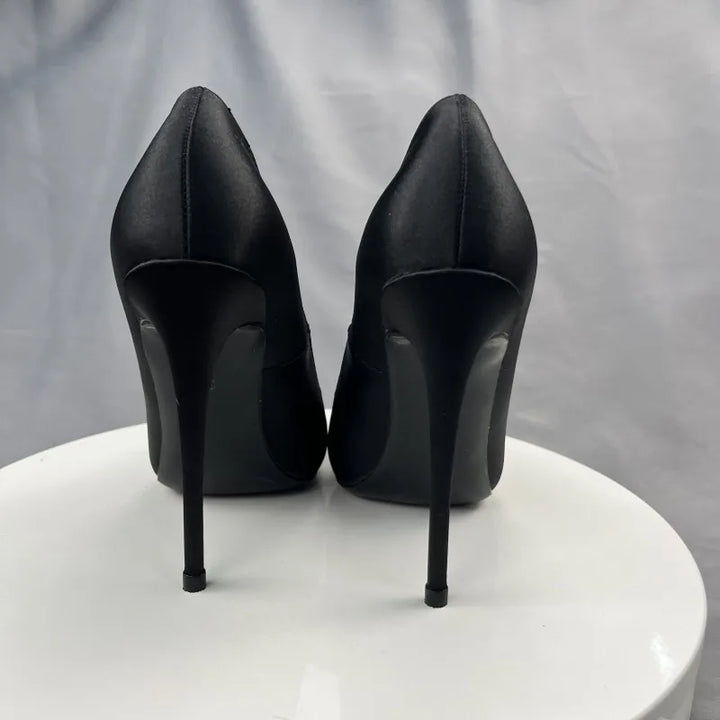 👠 Tikicup Satin High Heels – All Black Elegance
Chic, sexy, and made to impress.
✅ Pointed toe elegance
✅ Formal & fashionable
✅ Perfect for parties or formal looks

🛒 Shop now at www.clickmart.com