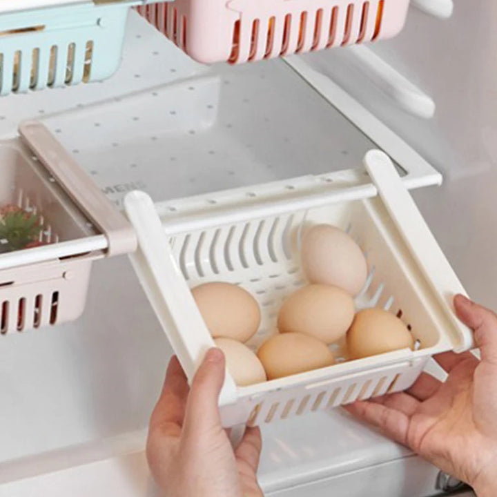 Maximize Your Fridge Space!
🧊 Say goodbye to clutter with this retractable, multi-functional storage rack. Perfect for organizing fruits, veggies, snacks & more.
💦 Built-in drain keeps everything fresh and dry.
✨ Slide, store, and save space instantly!