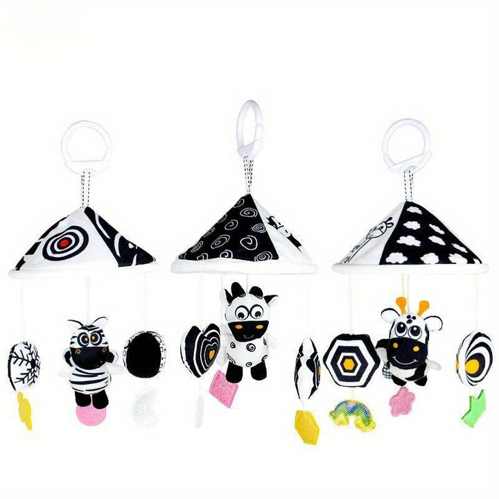 Visual Stimulation On the Go
This black and white hanging baby toy features soft animal designs, gentle wind chimes, and high-contrast colors to support early visual development. Perfect for cribs, strollers, car seats, and baby carriers. 👶🖤🤍